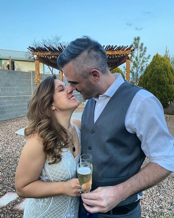Couple kissing on wedding day