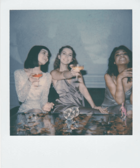 Women toasting at party - how to make friends as an adult